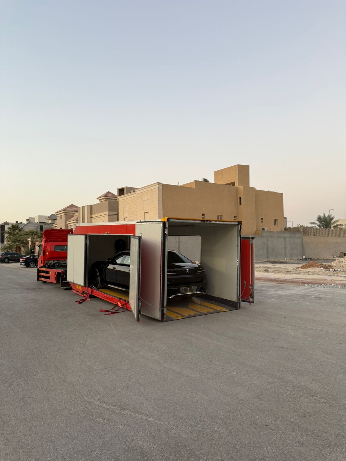Loading a vehicle into the enclosed carrier