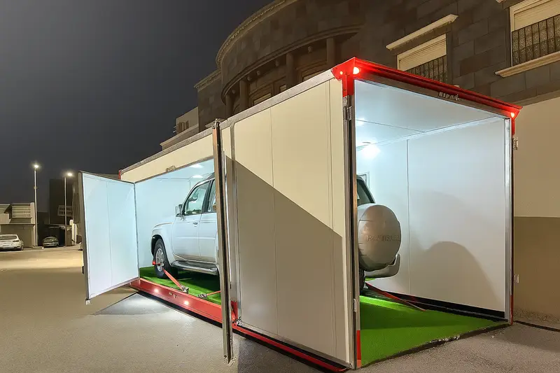 Lit enclosed bay — secure vehicle loading